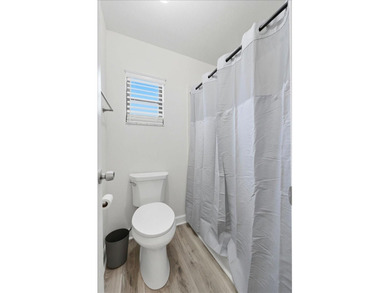 Welcome to this beautifully updated two-bedroom, two-bath home on Sandpiper Golf Club in Florida - for sale on GolfHomes.com, golf home, golf lot