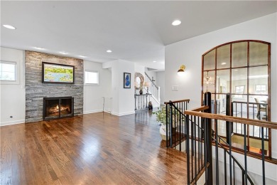 Wake up each day to the peaceful beauty of Lake Quivira in this on Lake Quivira Country Club in Kansas - for sale on GolfHomes.com, golf home, golf lot