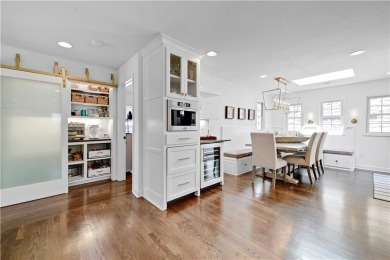 Wake up each day to the peaceful beauty of Lake Quivira in this on Lake Quivira Country Club in Kansas - for sale on GolfHomes.com, golf home, golf lot
