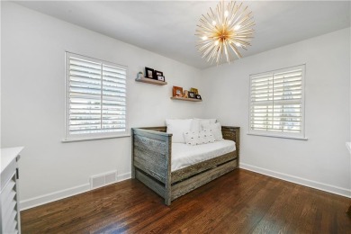 Wake up each day to the peaceful beauty of Lake Quivira in this on Lake Quivira Country Club in Kansas - for sale on GolfHomes.com, golf home, golf lot
