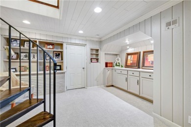 Wake up each day to the peaceful beauty of Lake Quivira in this on Lake Quivira Country Club in Kansas - for sale on GolfHomes.com, golf home, golf lot
