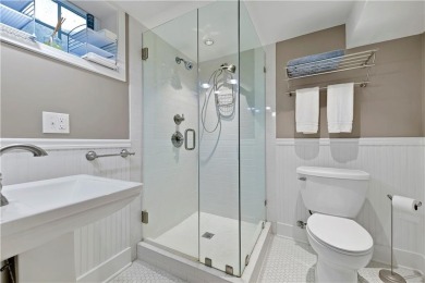 Wake up each day to the peaceful beauty of Lake Quivira in this on Lake Quivira Country Club in Kansas - for sale on GolfHomes.com, golf home, golf lot