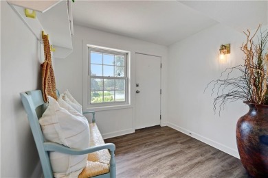 Wake up each day to the peaceful beauty of Lake Quivira in this on Lake Quivira Country Club in Kansas - for sale on GolfHomes.com, golf home, golf lot