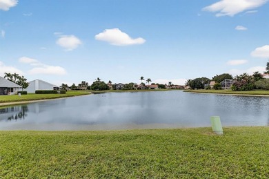 NICE VILLA OVER 1250 SF WITH A FABULOUS WATER VIEW. CATHEDRAL on Westchester Golf and Country Club in Florida - for sale on GolfHomes.com, golf home, golf lot