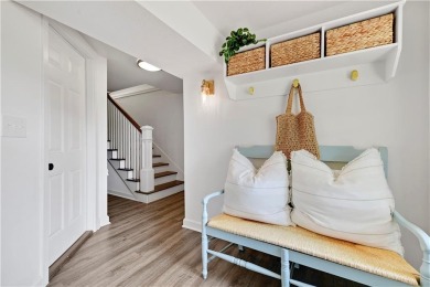 Wake up each day to the peaceful beauty of Lake Quivira in this on Lake Quivira Country Club in Kansas - for sale on GolfHomes.com, golf home, golf lot