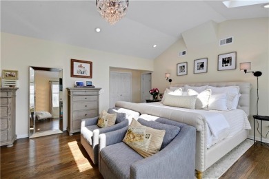 Wake up each day to the peaceful beauty of Lake Quivira in this on Lake Quivira Country Club in Kansas - for sale on GolfHomes.com, golf home, golf lot