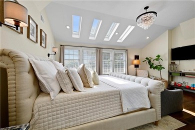 Wake up each day to the peaceful beauty of Lake Quivira in this on Lake Quivira Country Club in Kansas - for sale on GolfHomes.com, golf home, golf lot