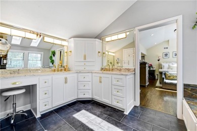 Wake up each day to the peaceful beauty of Lake Quivira in this on Lake Quivira Country Club in Kansas - for sale on GolfHomes.com, golf home, golf lot
