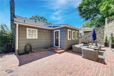 Wake up each day to the peaceful beauty of Lake Quivira in this on Lake Quivira Country Club in Kansas - for sale on GolfHomes.com, golf home, golf lot