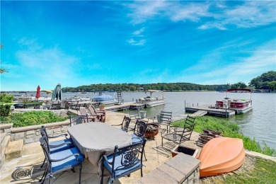 Wake up each day to the peaceful beauty of Lake Quivira in this on Lake Quivira Country Club in Kansas - for sale on GolfHomes.com, golf home, golf lot