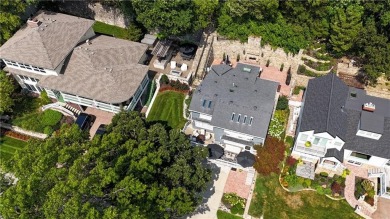 Wake up each day to the peaceful beauty of Lake Quivira in this on Lake Quivira Country Club in Kansas - for sale on GolfHomes.com, golf home, golf lot