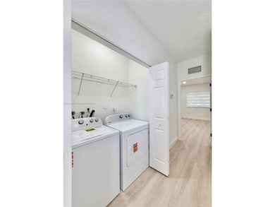 Spacious 3-bedroom/3-bathroom townhome featuring an open layout on Woodlands Country Club in Florida - for sale on GolfHomes.com, golf home, golf lot