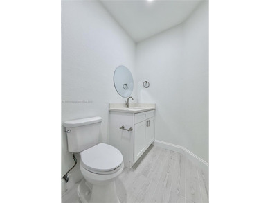 Spacious 3-bedroom/3-bathroom townhome featuring an open layout on Woodlands Country Club in Florida - for sale on GolfHomes.com, golf home, golf lot