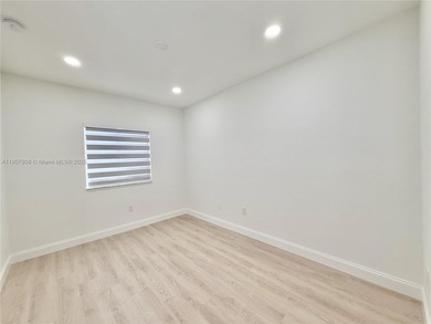 Spacious 3-bedroom/3-bathroom townhome featuring an open layout on Woodlands Country Club in Florida - for sale on GolfHomes.com, golf home, golf lot