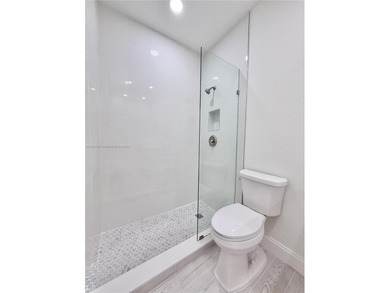 Spacious 3-bedroom/3-bathroom townhome featuring an open layout on Woodlands Country Club in Florida - for sale on GolfHomes.com, golf home, golf lot