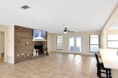 Located in the heart of Tiger Point, this 4-bedroom, 2-bath home on Tiger Point Golf and Country Club in Florida - for sale on GolfHomes.com, golf home, golf lot