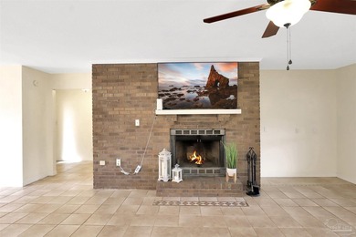 Located in the heart of Tiger Point, this 4-bedroom, 2-bath home on Tiger Point Golf and Country Club in Florida - for sale on GolfHomes.com, golf home, golf lot