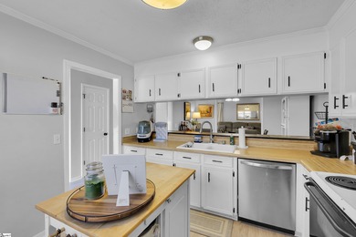 Welcome home to this beautifully updated END-UNIT condo in the on Holly Tree Country Club in South Carolina - for sale on GolfHomes.com, golf home, golf lot