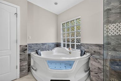 Welcome to the highly sought after gated community of Bayou Club on Bayou Golf Club in Florida - for sale on GolfHomes.com, golf home, golf lot