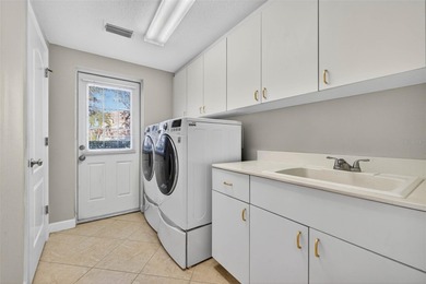 Welcome to the highly sought after gated community of Bayou Club on Bayou Golf Club in Florida - for sale on GolfHomes.com, golf home, golf lot