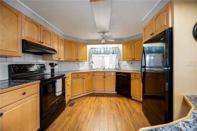 Seller is offering $10,000 to the new buyer for their shares on Twin Isles Country Club in Florida - for sale on GolfHomes.com, golf home, golf lot