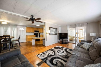 Seller is offering $10,000 to the new buyer for their shares on Twin Isles Country Club in Florida - for sale on GolfHomes.com, golf home, golf lot