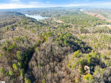 Listed by Kim Crain/Herlong-Sir.  156 Eastatoe Parkway offers a on The Cliffs At Keowee Vineyards Golf Club in South Carolina - for sale on GolfHomes.com, golf home, golf lot