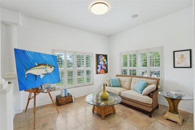 THIS HOME IS A  SUPER HERO that bravely fought the summer on Tarpon Springs Golf Course in Florida - for sale on GolfHomes.com, golf home, golf lot