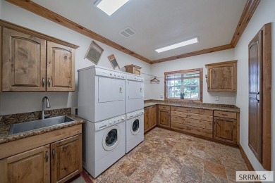Nestled in the prestigious Fairway Estates, this exquisite home on Sage Lakes Municipal Golf Course in Idaho - for sale on GolfHomes.com, golf home, golf lot