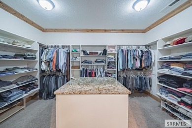 Nestled in the prestigious Fairway Estates, this exquisite home on Sage Lakes Municipal Golf Course in Idaho - for sale on GolfHomes.com, golf home, golf lot