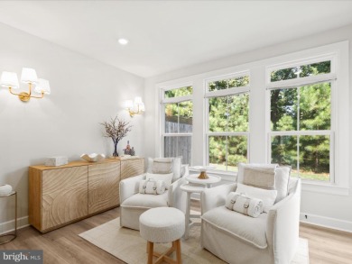 Welcome to 22179 Dune Circle, a stunning end-unit townhome in on The Peninsula Golf and Country Club in Delaware - for sale on GolfHomes.com, golf home, golf lot