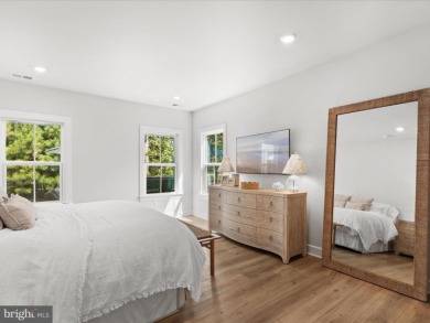 Welcome to 22179 Dune Circle, a stunning end-unit townhome in on The Peninsula Golf and Country Club in Delaware - for sale on GolfHomes.com, golf home, golf lot