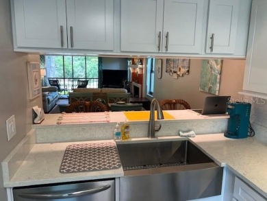 VERY DESIRABLE GATED COMMUNITY OF EAST LAKE WOODLANDS, CORNER on East Lake Woodlands Country Club in Florida - for sale on GolfHomes.com, golf home, golf lot