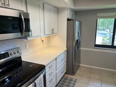 VERY DESIRABLE GATED COMMUNITY OF EAST LAKE WOODLANDS, CORNER on East Lake Woodlands Country Club in Florida - for sale on GolfHomes.com, golf home, golf lot