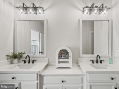 Welcome to 22179 Dune Circle, a stunning end-unit townhome in on The Peninsula Golf and Country Club in Delaware - for sale on GolfHomes.com, golf home, golf lot
