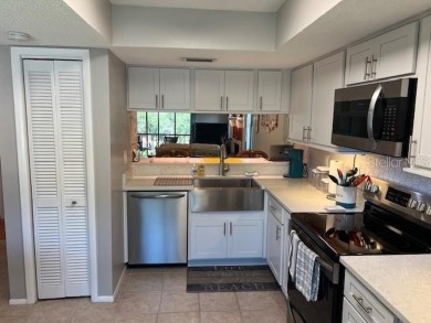 VERY DESIRABLE GATED COMMUNITY OF EAST LAKE WOODLANDS, CORNER on East Lake Woodlands Country Club in Florida - for sale on GolfHomes.com, golf home, golf lot