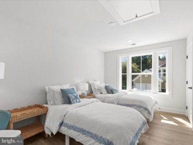 Welcome to 22179 Dune Circle, a stunning end-unit townhome in on The Peninsula Golf and Country Club in Delaware - for sale on GolfHomes.com, golf home, golf lot