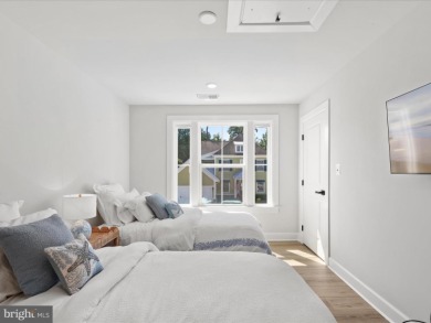 Welcome to 22179 Dune Circle, a stunning end-unit townhome in on The Peninsula Golf and Country Club in Delaware - for sale on GolfHomes.com, golf home, golf lot