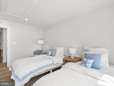 Welcome to 22179 Dune Circle, a stunning end-unit townhome in on The Peninsula Golf and Country Club in Delaware - for sale on GolfHomes.com, golf home, golf lot