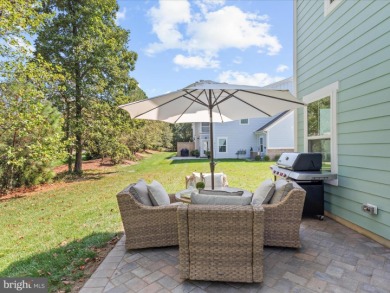 Welcome to 22179 Dune Circle, a stunning end-unit townhome in on The Peninsula Golf and Country Club in Delaware - for sale on GolfHomes.com, golf home, golf lot