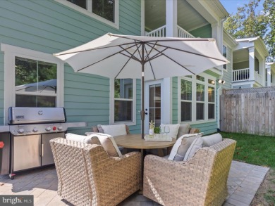 Welcome to 22179 Dune Circle, a stunning end-unit townhome in on The Peninsula Golf and Country Club in Delaware - for sale on GolfHomes.com, golf home, golf lot