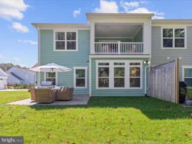 Welcome to 22179 Dune Circle, a stunning end-unit townhome in on The Peninsula Golf and Country Club in Delaware - for sale on GolfHomes.com, golf home, golf lot