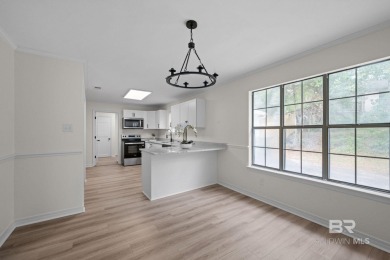 Completely renovated and move-in ready, this stunning Lake on Lake Forest Yacht and Country Club in Alabama - for sale on GolfHomes.com, golf home, golf lot