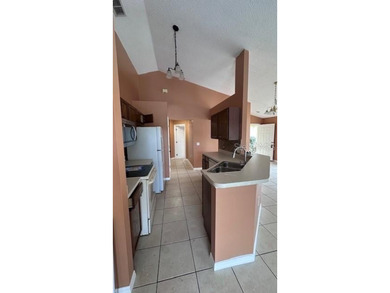 Under contract-accepting backup offers. Welcome to resort-style on Southern Dunes Golf and Country Club in Florida - for sale on GolfHomes.com, golf home, golf lot