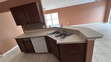 Under contract-accepting backup offers. Welcome to resort-style on Southern Dunes Golf and Country Club in Florida - for sale on GolfHomes.com, golf home, golf lot