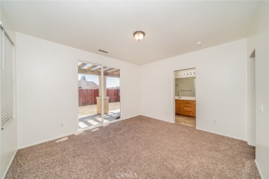 This cute single-story home in  the Tournament Hills community on Morongo Golf Club at Tukwet Canyon in California - for sale on GolfHomes.com, golf home, golf lot
