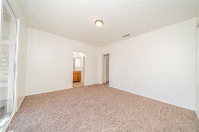 This cute single-story home in  the Tournament Hills community on Morongo Golf Club at Tukwet Canyon in California - for sale on GolfHomes.com, golf home, golf lot