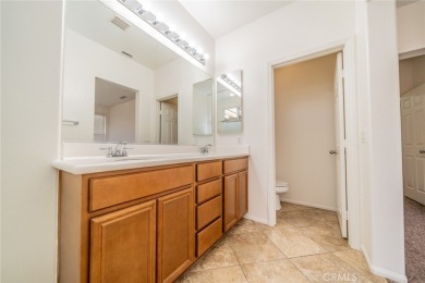 This cute single-story home in  the Tournament Hills community on Morongo Golf Club at Tukwet Canyon in California - for sale on GolfHomes.com, golf home, golf lot