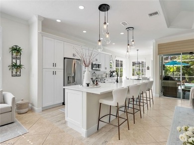 Your coastal-inspired retreat awaits tucked within Canterbury on Kensington Golf and Country Club in Florida - for sale on GolfHomes.com, golf home, golf lot