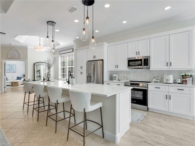 Your coastal-inspired retreat awaits tucked within Canterbury on Kensington Golf and Country Club in Florida - for sale on GolfHomes.com, golf home, golf lot